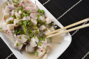 tilapia ceviche with red onion.